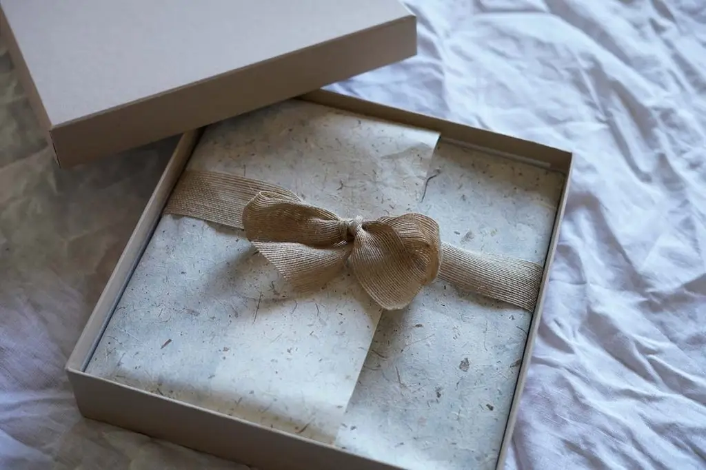Photo Album Box - Standard with all orders. Available in natural (as pictured) or black.