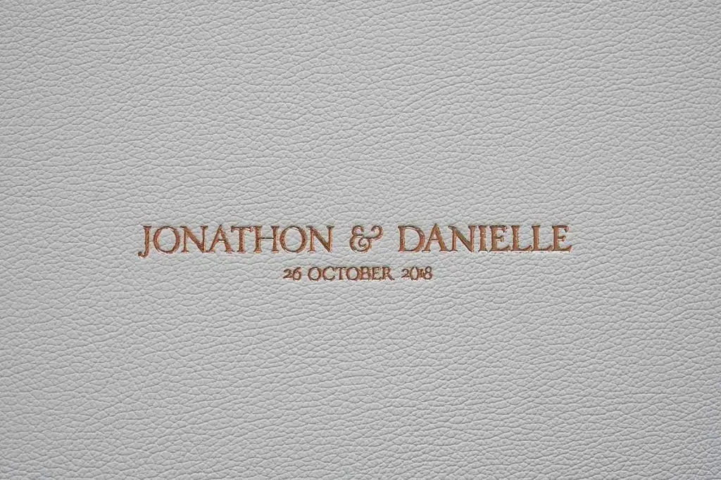Classic Leather Photo Album in colour Ivory with Gold lettering. Ivory leather photo album cover with gold embossing perfect for a neutral toned wedding colour palette.