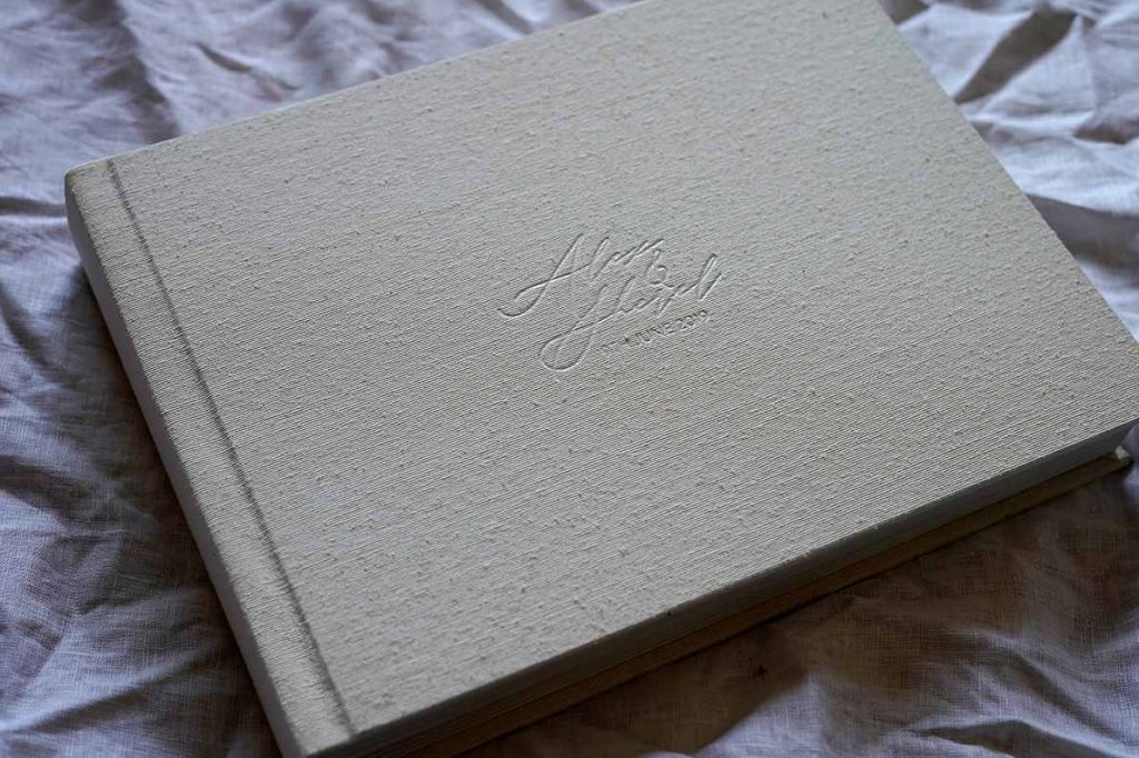 Silk photo album for wedding photos featuring a natural colour cover but an extensive colour palette is available
