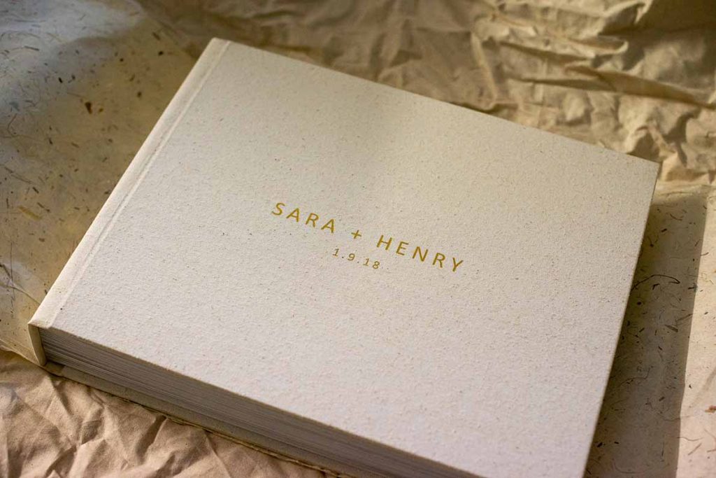 Australia's Best Photo Albums. This Wedding Album features a luxe linen cover in a natural colour with gold lettering