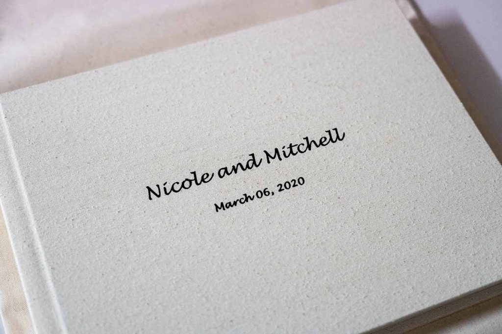 Photo Album with Silk cover and black embossing. Our albums also make for great wedding guest book ideas.